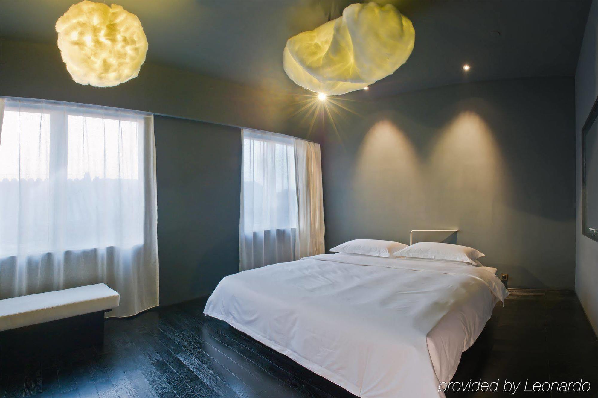 The Emperor Tiananmen Beijing Otel Dış mekan fotoğraf A room at the hotel