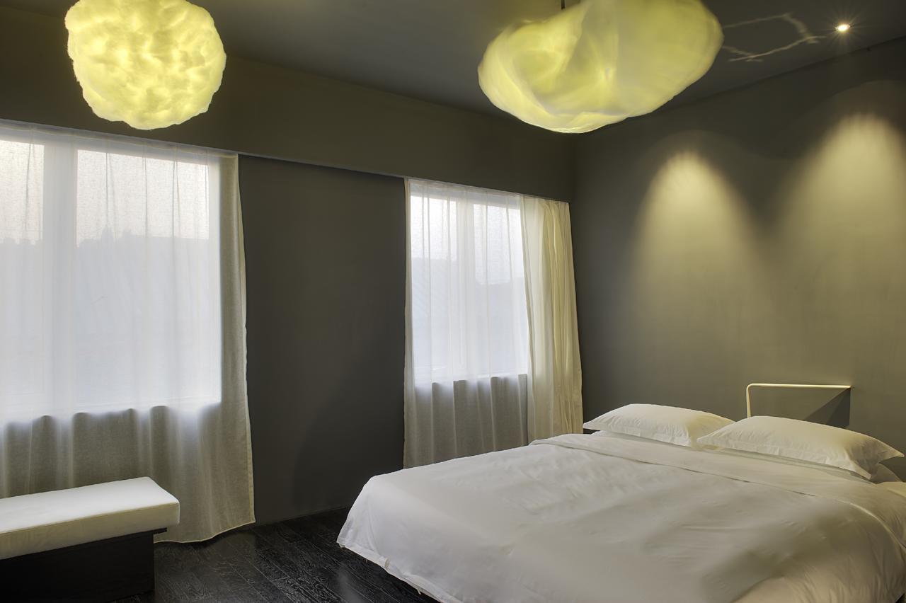 The Emperor Tiananmen Beijing Otel Dış mekan fotoğraf A room at the hotel