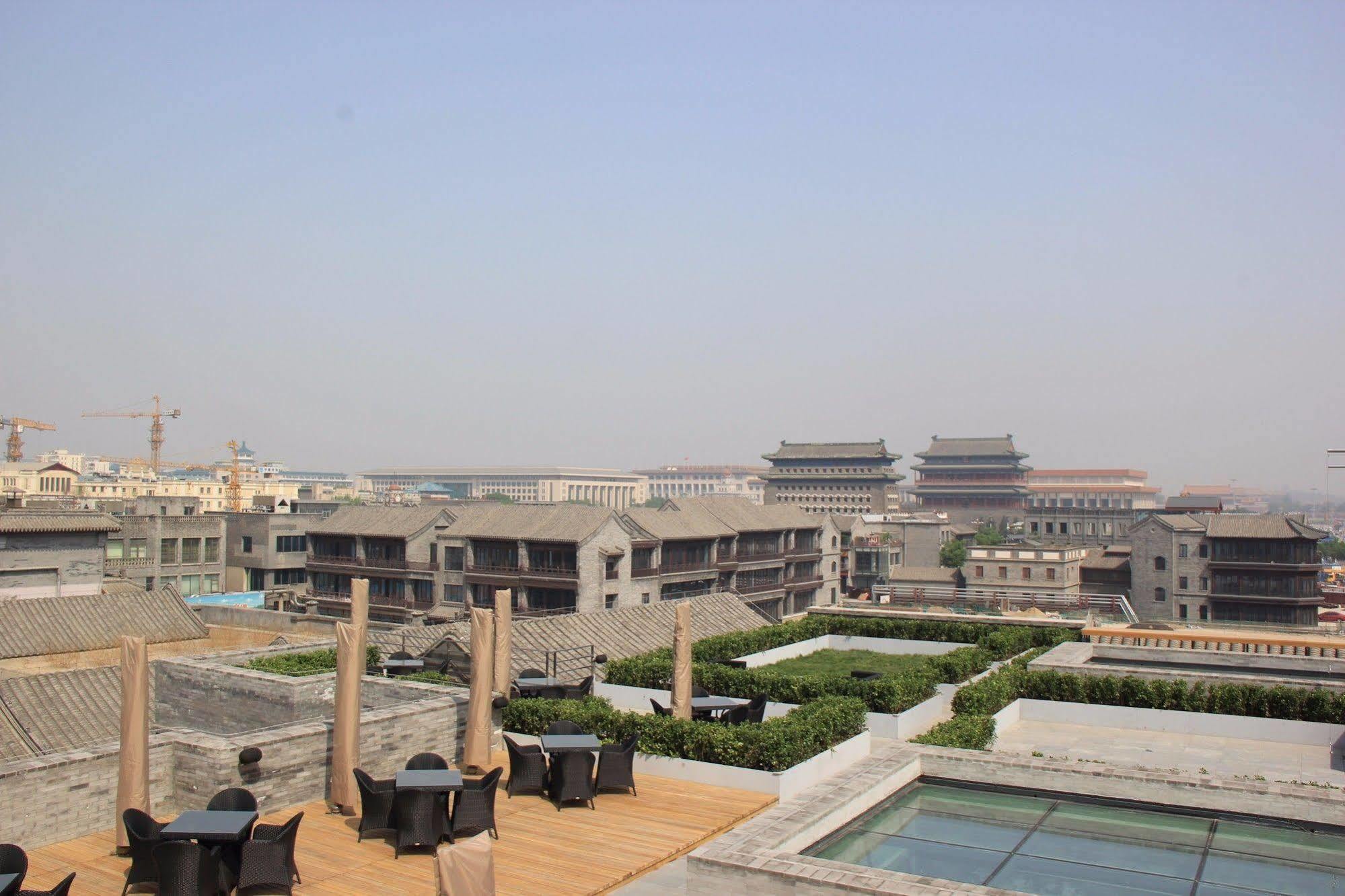 The Emperor Tiananmen Beijing Otel Dış mekan fotoğraf The view of the Forbidden City from the rooftop of the hotel